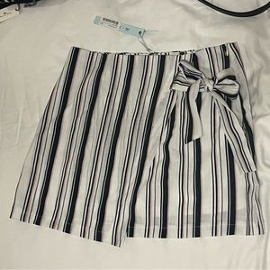 She + Sky striped blue, white, and light pink mini skirt, size Large. NWT.